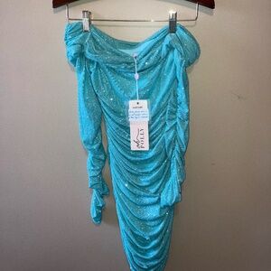 "All That Glitters Long Sleeve Bardot Mini Dress in Turquoise" by Oh Polly